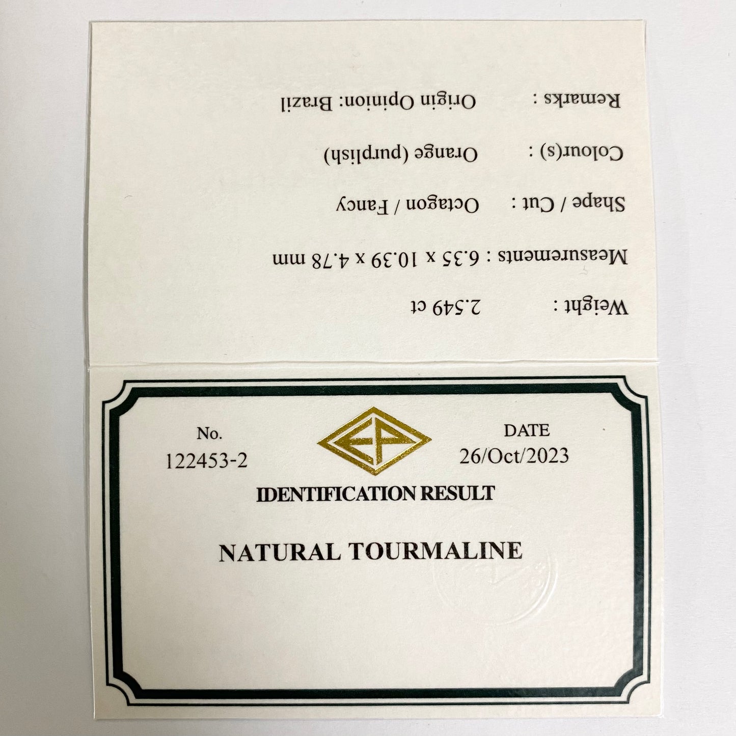 オレンジとピンク混ざるシザースの煌めきとスケッチのような成長線がたまらない★トルマリン2.549ct