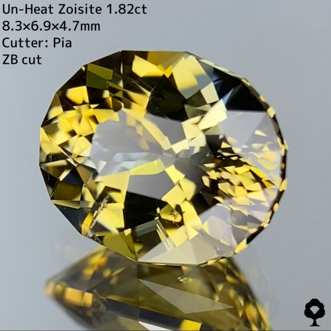 ゴールドとグリーンとの多色感がたまらない色合いのZBカット★非加熱ゾイサイト 1.82ct