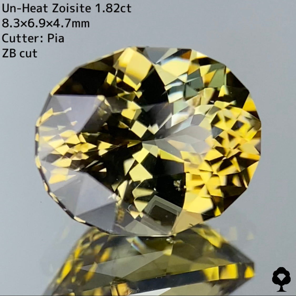 ゴールドとグリーンとの多色感がたまらない色合いのZBカット★非加熱ゾイサイト 1.82ct