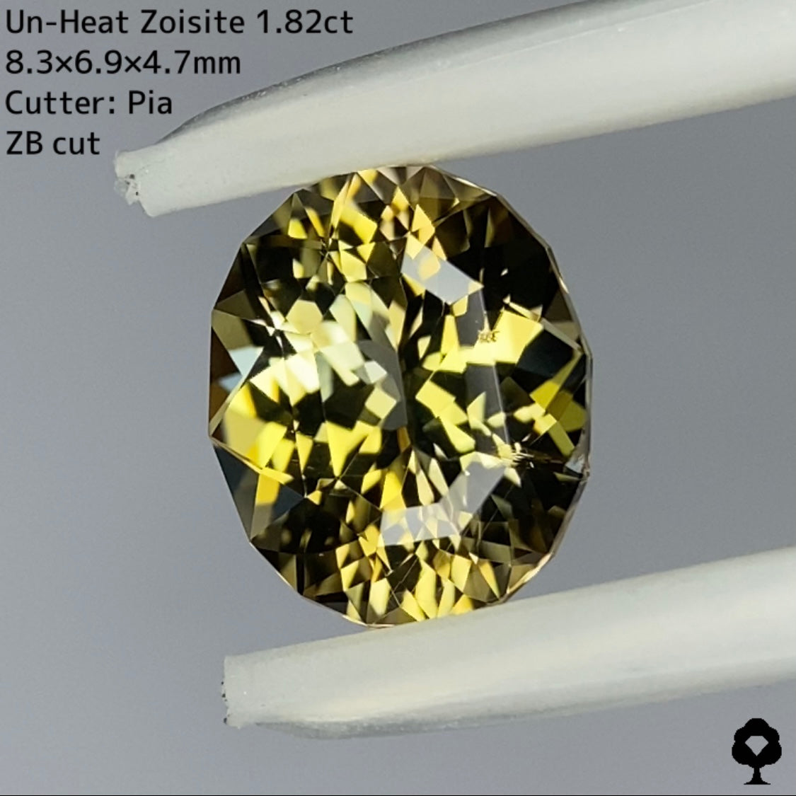 ゴールドとグリーンとの多色感がたまらない色合いのZBカット★非加熱ゾイサイト 1.82ct
