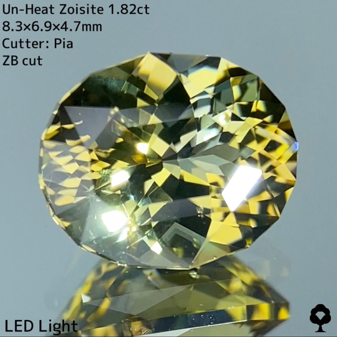 ゴールドとグリーンとの多色感がたまらない色合いのZBカット★非加熱ゾイサイト 1.82ct
