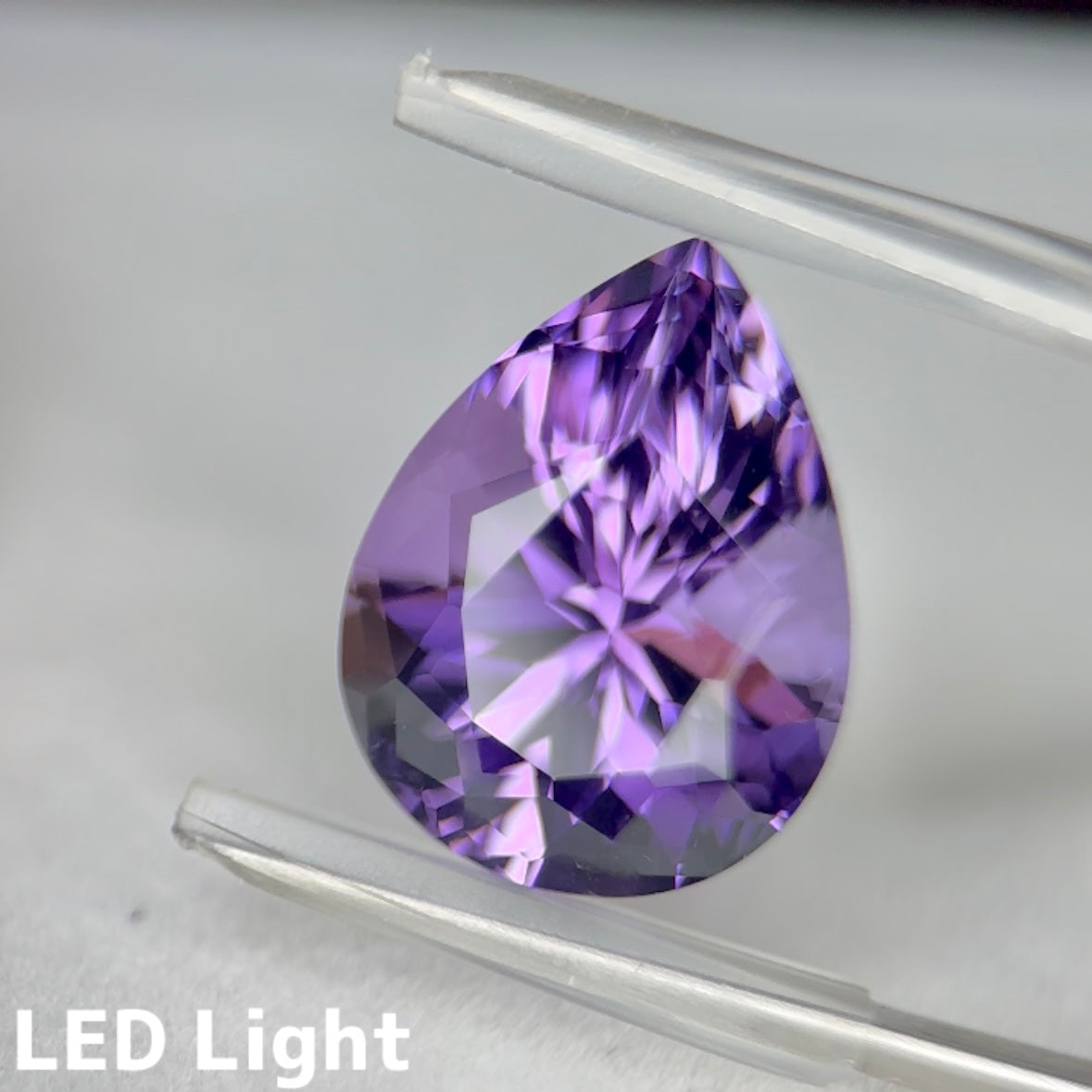 アメジスト 9.37ct 変則キューブカット