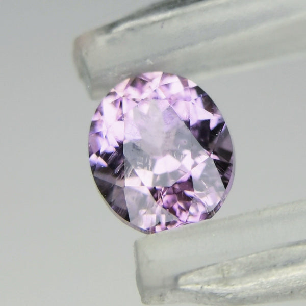 綺麗なパープルを噛んだピンクの非加熱ピンクゾイサイト 0.292ct