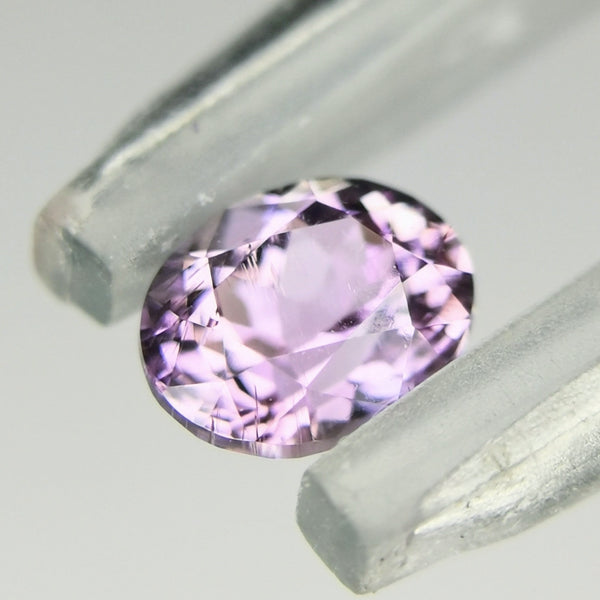 綺麗なパープルを噛んだピンクの非加熱ピンクゾイサイト 0.292ct